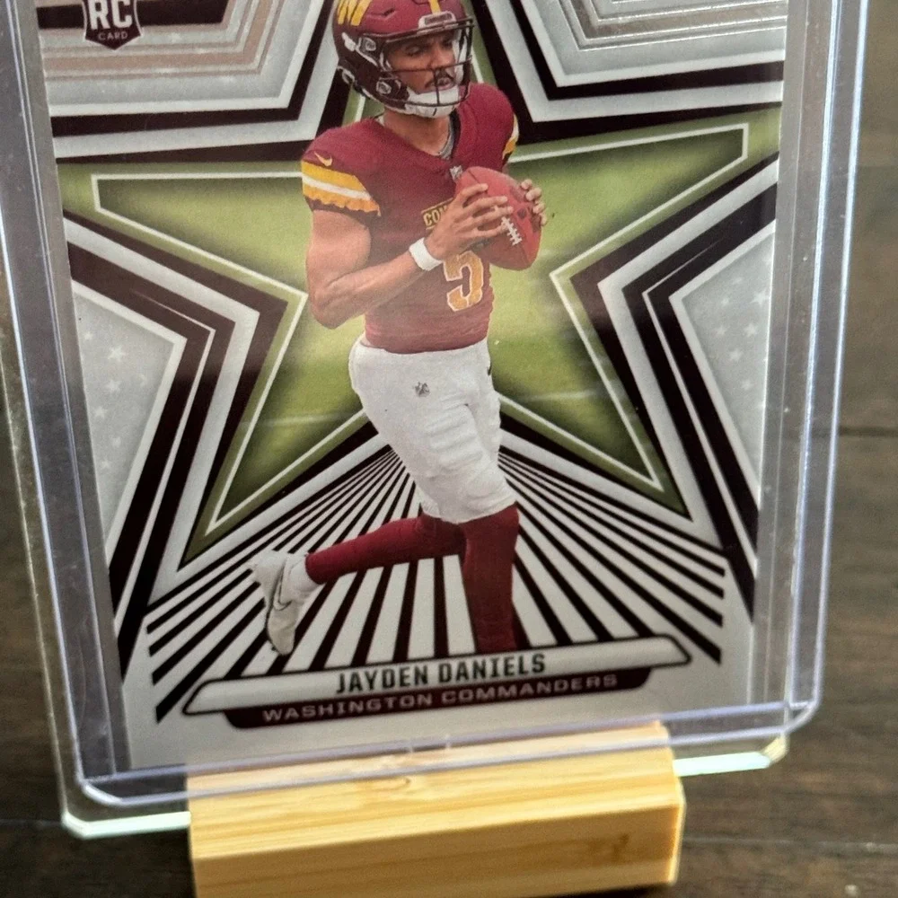 Panini Rookies & Stars Football Card Jayden Daniels Burgundy 2024 RC #148